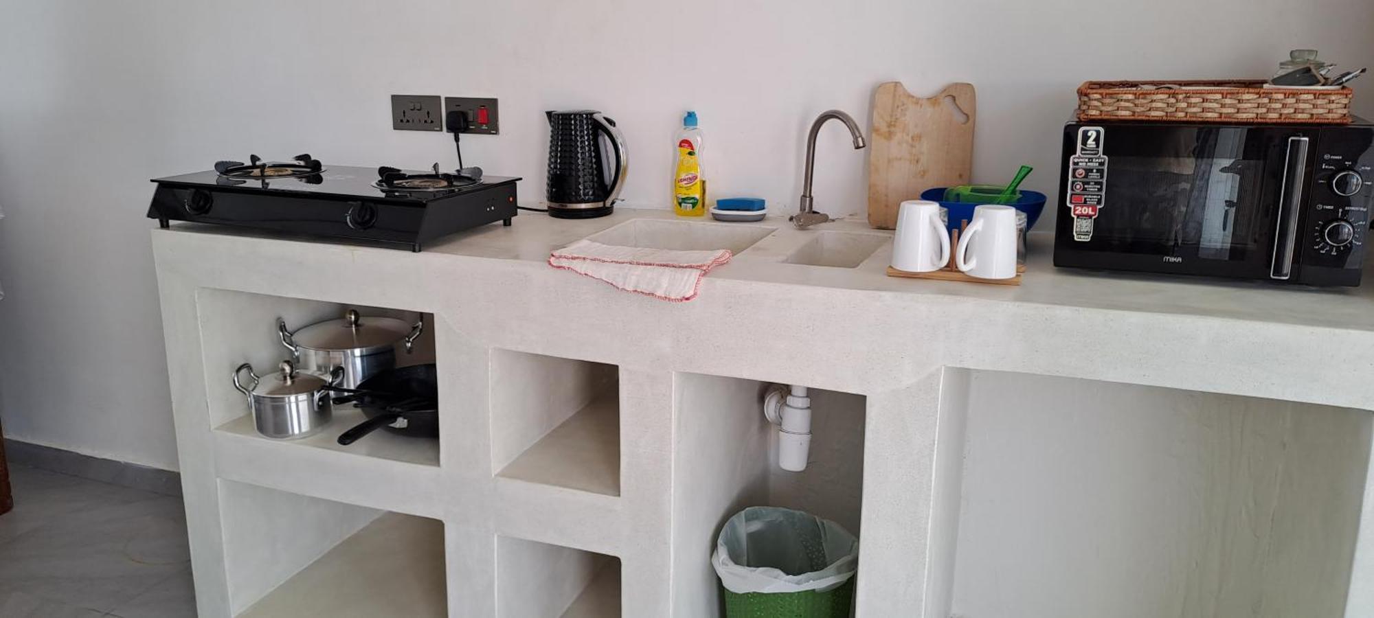 Cave Diani Holiday Apartments Диани Бийч Екстериор снимка